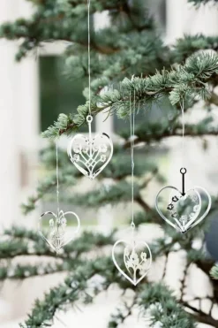 Jette Frölich Design Design Juleophæng Sølvhjerter med blomster – 4 stk. H 6,5 x B 5,5 x D 5,5 cm – Sølvfarvet